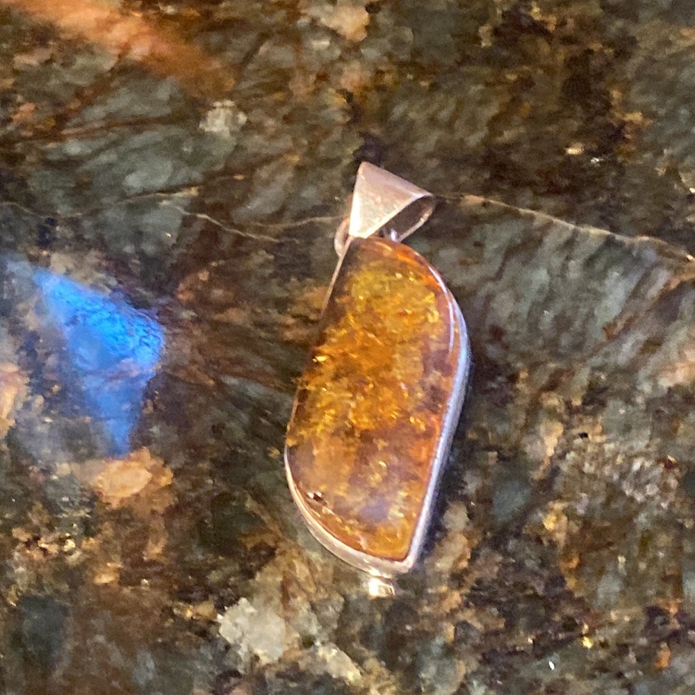 Large, genuine, amber, and Sterling silver pendant